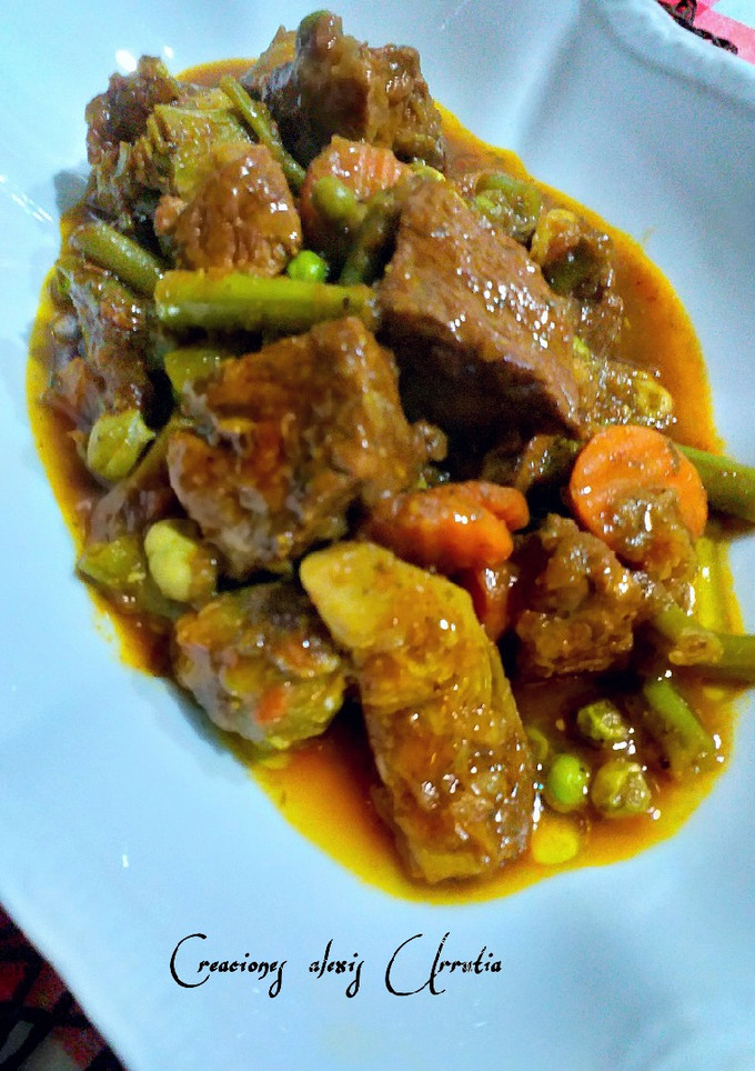 Una foto de Ternera con menestra de yverduras y ras el hanout