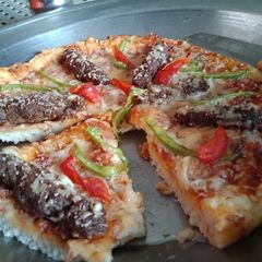 A picture of Jhat patt 5 mint Bun pizza.