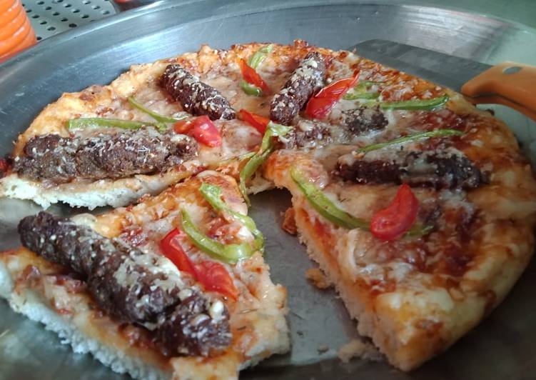 Steps to Make Award-winning Jhat patt 5 mint Bun pizza