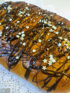 Una foto de Coca de brioche y chocolate