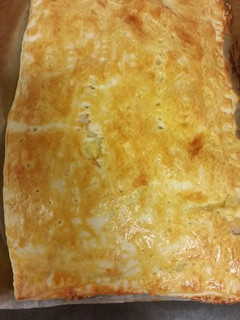 Una foto de Empanada de pollo, queso y bechamell