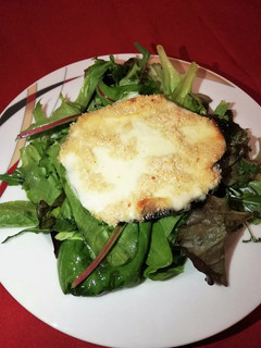 Una foto de Champiñones portobello rellenos de queso