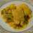 Bacalao en salsa con pimientos y gambas