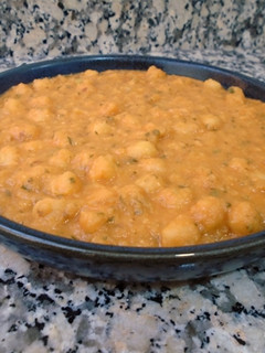 Una foto de Crema de lentejas rojas con garbanzos