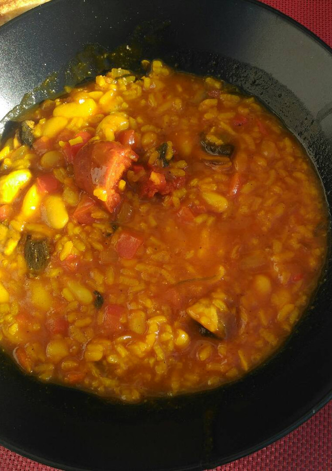 Una foto de Arroz con habichuelas caldoso