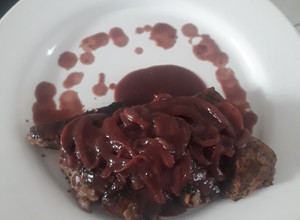 Una foto de Rib eye en reducción de vino tinto