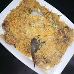 A picture of Chicken alu biryani.