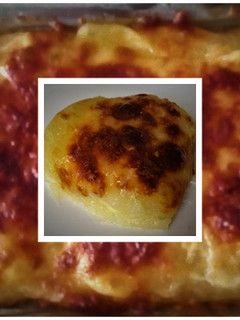 Una foto de Yuca con Queso al Horno