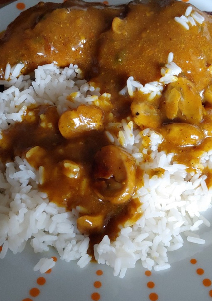 Una foto de Trasero o muslo de pollo, en salsa masala