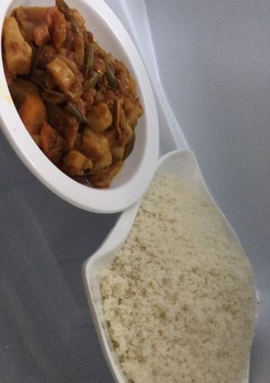 A picture of Rice grit with vegetables soup.