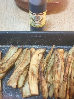 Una foto de Berenjena frita con miel de caña