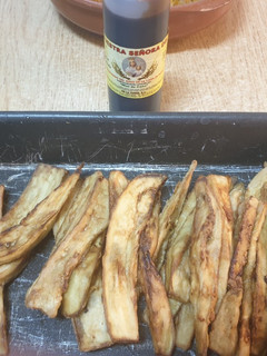 Una foto de Berenjena frita con miel de caña