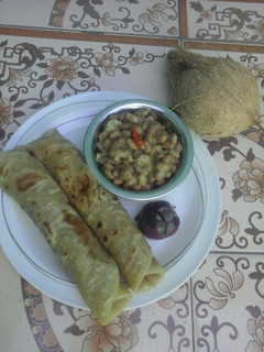A picture of Coconut beans served with chapati.