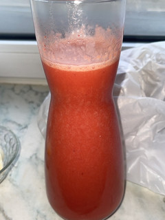 Una foto de Zumo de fresa y naranja