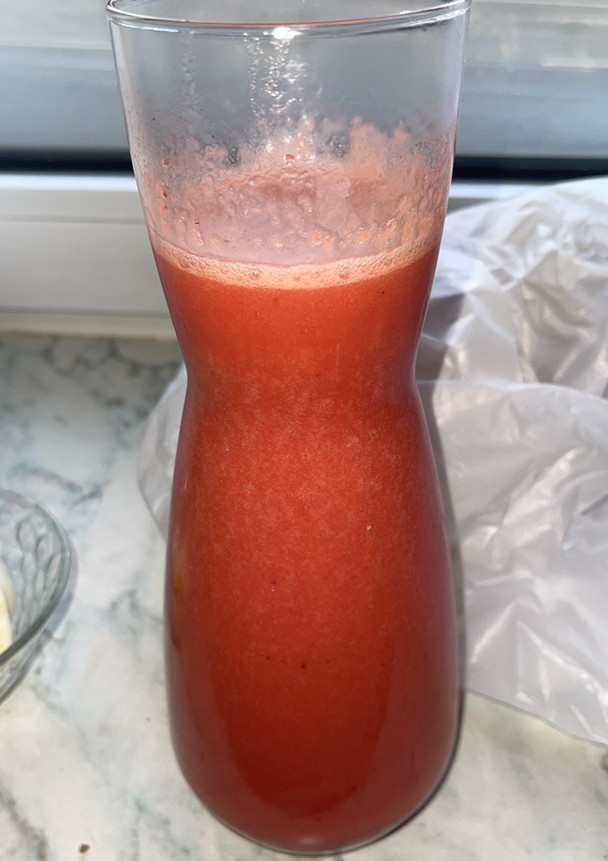 Una foto de Zumo de fresa y naranja
