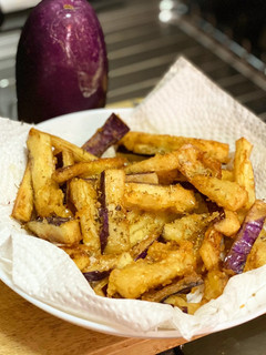A picture of Fried Eggplant w Honey Drizzle.