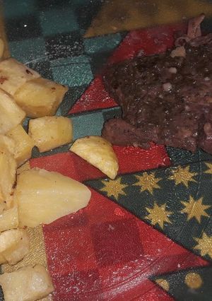 Una foto de Carne al vino con papas