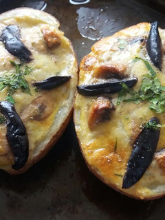 Una foto de Papas rellenas con champiñón y huevo