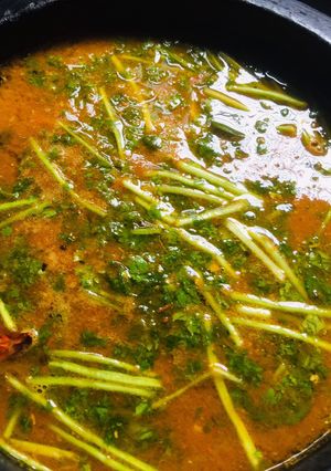 A picture of Tomatoes rasam.