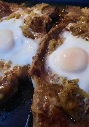 Una foto de Bife a caballo con Mostaza y miel
