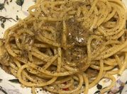 Una foto di alici in padella