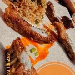 Peas pulao and beef biscuits A picture of Peas pulao and beef biscuits.