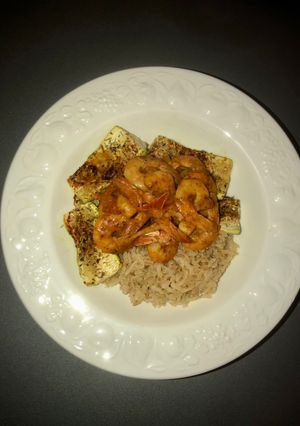 Une photo de Crevettes curry coco 🍤 & courgette riz 🥒🍚