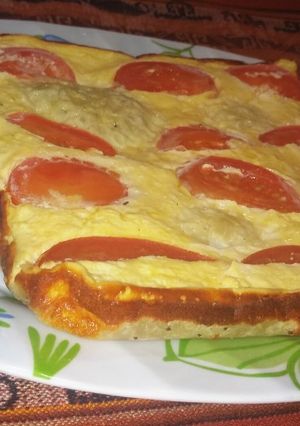 Una foto de Tarta soufflé de queso y tomates (en la flip)