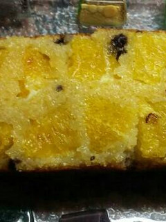 Una foto de Budín húmedo de naranja granizado