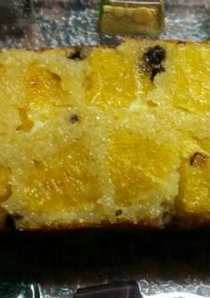 Una foto de Budín húmedo de naranja granizado