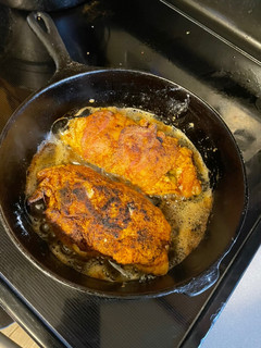 A picture of Fried stuffed/wrapped Chicken.