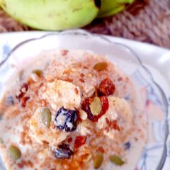 A picture of Oatmeal banana bowl with soymilk.