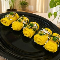 A picture of Golden Silk Khandvi.