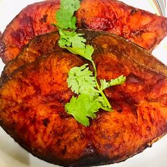 A picture of Fried king fish.