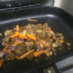 A picture of Sweet and sour beef.