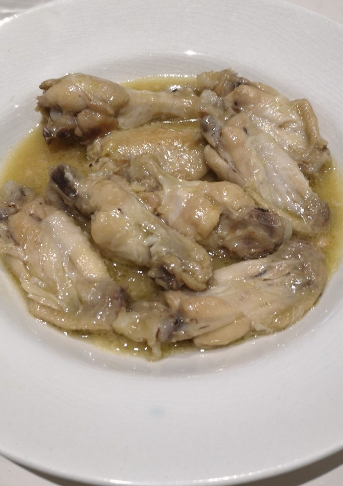 Una foto de Alitas de pollo al ajillo