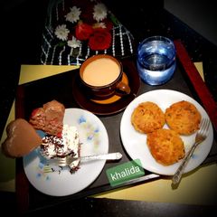 A picture of Chicken Shami kababs and Redvelvet Cake.