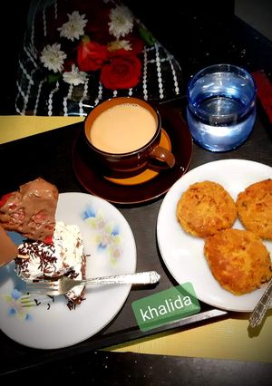 A picture of Chicken Shami kababs and Redvelvet Cake.