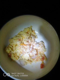A picture of Egg sauce with bread.