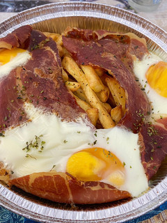 Una foto de Huevos rotos con jamón airfryer