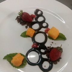 A picture of Strawberries and mango salad.