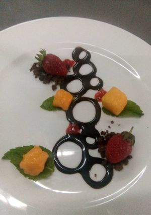 A picture of Strawberries and mango salad.