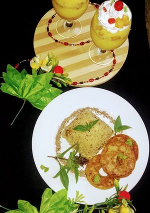 A picture of Rice with potato donuts and custard 😍❤️.