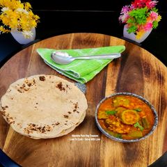 A picture of Dhaba-Style Ridge Gourd Red Lentil Curry - Exquisitely Delicious - Torai Masoor Dal Rasedar Sabzi.