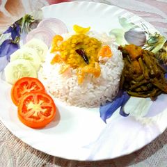 Bihari Lunch Platter- Dal, Rice, Bodi(Long Beans) Potato Sabzi A picture of Bihari Lunch Platter- Dal, Rice, Bodi(Long Beans) Potato Sabzi.