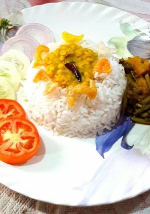 A picture of Bihari Lunch Platter- Dal, Rice, Bodi(Long Beans) Potato Sabzi.