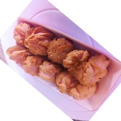 A picture of Strawberry cookies and tea scones.