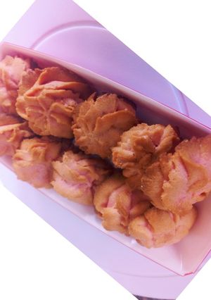A picture of Strawberry cookies and tea scones.