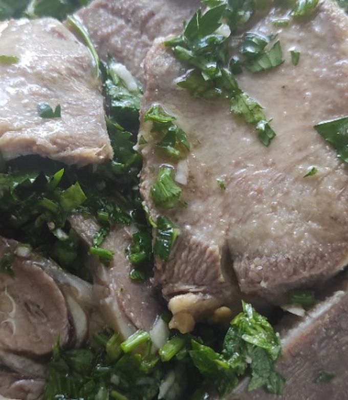 Una foto de Lengua a la vinagreta