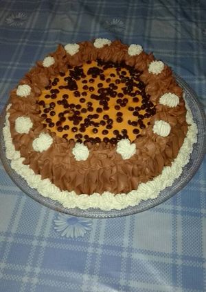 Foto principal de Tarta de mousse de naranja con chocolate y trufa